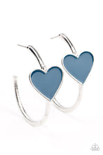 Load image into Gallery viewer, A charming Mykonos Blue heart adorns the front of a classic silver hoop resulting in a whimsical fashion. Earring attaches to a standard post fitting. Hoop measures approximately 1 1/4&quot; in diameter.  Sold as one pair of hoop earrings.
