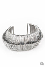 Load image into Gallery viewer, Layer after layer of glistening silver wire wraps around an oversized silver cuff. The center of the wire wrap comes to a peak, adding edge to the intense industrial display.  Sold as one individual bracelet.
