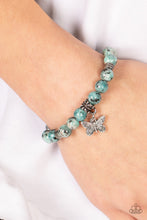 Load image into Gallery viewer, Infused with a silver butterfly charm, textured silver accents and black speckled blue stone beads are threaded along stretchy bands around the wrist for a whimsical look.  Sold as one individual bracelet.

