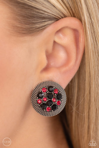 A glitzy collection of red and black rhinestones are encircled with a silver rope-like border, resulting in a smoldering centerpiece. Earring attaches to a standard clip-on fitting.  Sold as one pair of clip-on earrings.