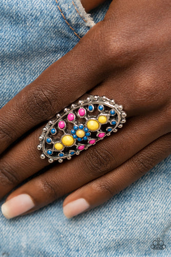 Dainty Illuminating, Mykonos Blue, and Fuchsia Fedora beads dot the airy front of a studded silver oval frame, creating a colorful floral pattern across the finger. Features a stretchy band for a flexible fit.  Sold as one individual ring.