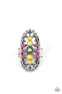 Dainty Illuminating, Mykonos Blue, and Fuchsia Fedora beads dot the airy front of a studded silver oval frame, creating a colorful floral pattern across the finger. Features a stretchy band for a flexible fit.  Sold as one individual ring.