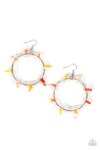 Dainty crystal-like beads and multicolored shell-like pieces are threaded along dainty wires, creating glitzy loops around an oversized silver ring for a beach inspired fashion. Earring attaches to a standard fishhook fitting.  Sold as one pair of earrings.