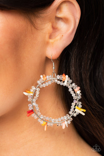 Dainty crystal-like beads and multicolored shell-like pieces are threaded along dainty wires, creating glitzy loops around an oversized silver ring for a beach inspired fashion. Earring attaches to a standard fishhook fitting.  Sold as one pair of earrings.