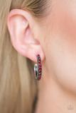 Load image into Gallery viewer, Encrusted in dazzling red rhinestones, a studded silver hoop swings from the ear for a glamorous look. Earring attaches to a standard post fitting. Hoop measures 1" in diameter. Sold as one pair of hoop earrings.

