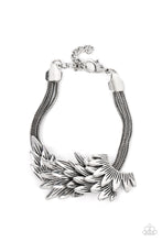Load image into Gallery viewer, Feathery silver frames delicately overlap across the center of the wrist, creating a boa-like centerpiece atop rows of rustic silver chains. Features an adjustable clasp closure.  Sold as one individual bracelet.

