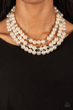 Load image into Gallery viewer, Infused with silver beads and silver rings, a bubbly collection of white pearls are threaded along invisible wires that cascade into effervescent layers below the collar. Features an adjustable clasp closure.  Sold as one individual necklace. Includes one pair of matching earrings.
