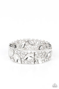 Oversized marquise cut white rhinestones sparkle atop icy frames of dainty silver studs and white rhinestones that are threaded along stretchy bands around the wrist for a jaw-dropping dazzle.  Sold as one individual bracelet.