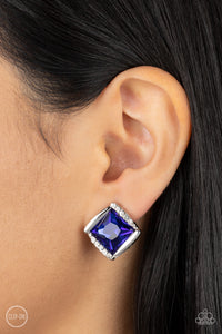 Shiny silver bars gently overlap with white rhinestone encrusted silver bars around a square cut blue rhinestone, resulting in a refined radiance. Earring attaches to a standard clip-on fitting.  Sold as one pair of clip-on earrings.
