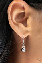 Load image into Gallery viewer, Small rhinestone hanging from a silver fish hook earring.
