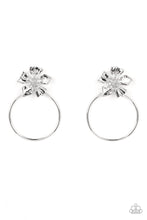 Load image into Gallery viewer, Featuring lifelike textures, a shimmery silver buttercup blooms atop an oversized silver hoop for a whimsical allure. Earring attaches to a standard post fitting.  Sold as one pair of post earrings.
