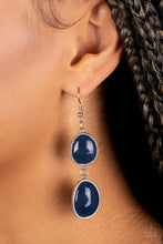 Load image into Gallery viewer, Set in textured silver frames, two asymmetrical navy blue beads link into a colorful lure for a summery fashion. Earring attaches to a standard fishhook fitting. /P&gt;  Sold as one pair of earrings.
