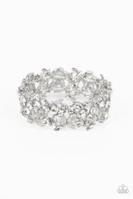 Load image into Gallery viewer, Round and marquise-cut white gems intertwine around polished silver studs and ornate feather-like details in a glitzy pattern. The textured, glittery display is threaded along elastic stretchy bands for a whimsical finish.  Sold as one individual bracelet.
