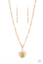Load image into Gallery viewer, Dangling from a gold figaro chain, a charming heart pendant swings. Stamped upon the shiny surface, the phrase &quot;Trust in the Lord&quot; with the bible reference listed below it &quot;Proverbs 3:5&quot; are listed in different fonts for an optimistic and hopeful finish. Features an adjustable clasp closure.  Sold as one individual necklace. Includes one pair of matching earrings.
