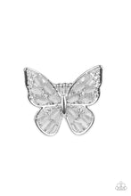 Load image into Gallery viewer, Shiny silver bars curl into the shape of a butterfly, creating a whimsical centerpiece that flutters atop the finger. White opalescent beads fill the inside of the wings, leaving spaces in between for the design to remain airy and light. Finally, tiny white rhinestones line the inside edges of the silver frame, adding a hint of irresistible sparkle to the mix. Features a stretchy band for a flexible fit.  Sold as one individual ring.
