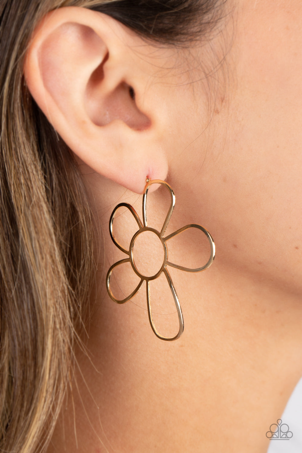 Shimmery, high-sheen gold is artfully shaped into an oversized flower. The open framework creates an air of whimsicality, as the exaggerated size of the design leaves a lasting impression. Earring attaches to a standard post fitting.  Sold as one pair of post earrings.