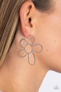 Shimmery, high-sheen silver is artfully shaped into an oversized flower. The open framework creates an air of whimsicality, as the exaggerated size of the design leaves a lasting impression. Earring attaches to a standard post fitting.  Sold as one pair of post earrings.