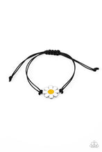 Load image into Gallery viewer, Held together and centered within soft black cording, a single daisy charm rests. Featuring a silver smiley face in its yellow center, this single flower provides a fashionably, minimalistic statement around the wrist. Features an adjustable sliding knot closure.  Sold as one individual bracelet.
