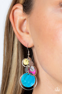 A colorful collection of yellow, hot pink, and turquoise shell-like discs and dainty silver rings dances from the top of a fishhook setting, gradually increasing in size as they fall further down the ear. Connected to the top-most hoop, silver-dotted leaf charms swing for additional eye-catching movement, resulting in a beach inspired lure. Earring attaches to a standard fishhook fitting.  Sold as one pair of earrings.