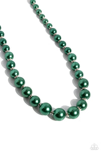 A single strand of emerald green pearls elegantly cascades below the collar, creating a glamorous graceful effect. Features an adjustable clasp closure.  Sold as one individual necklace. Includes one pair of matching earrings.