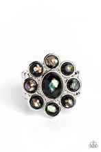 Load image into Gallery viewer, Pressed into a high-sheen silver frame, flecks of iridescent shell shimmer against a background of black, creating an ethereal flower centerpiece atop the finger. Features a stretchy band for a flexible fit. Due to its prismatic palette, color may vary.  Sold as one individual ring.
