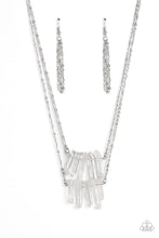 Load image into Gallery viewer, Two layers of transparent white crystal-like stones swings from the bottom of two dainty silver chains for a handcrafted, artisanal look. Features an adjustable clasp closure. As the stone elements in this piece are natural, some color variation is normal.  Sold as one individual necklace. Includes one pair of matching earrings.
