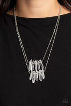 Load image into Gallery viewer, Two layers of transparent white crystal-like stones swings from the bottom of two dainty silver chains for a handcrafted, artisanal look. Features an adjustable clasp closure. As the stone elements in this piece are natural, some color variation is normal.  Sold as one individual necklace. Includes one pair of matching earrings.
