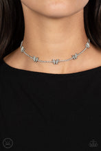 Load image into Gallery viewer, A row of dainty white rhinestones pressed into silver box-chain settings, a collection of silver butterflies coalesces around the neckline for a whimsical finish. Each butterfly features a dainty shimmer of white rhinestones on its wings, for a sparkly statement. Features an adjustable clasp closure.  Sold as one individual choker necklace. Includes one pair of matching earrings.
