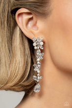 Load image into Gallery viewer, Radiant clusters of white reflective teardrop, marquise-cut and round gems combine with classic white pearls to create an explosion of glitz that extends down the ear. Hanging from the bottom of the light-reflecting earring, a white, reflective teardrop gem swings for some eye-catching shimmer against a backdrop of high-sheen silver. Earring attaches to a standard post fitting.  Sold as one pair of post earrings.
