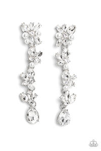 Radiant clusters of white reflective teardrop, marquise-cut and round gems combine with classic white pearls to create an explosion of glitz that extends down the ear. Hanging from the bottom of the light-reflecting earring, a white, reflective teardrop gem swings for some eye-catching shimmer against a backdrop of high-sheen silver. Earring attaches to a standard post fitting.  Sold as one pair of post earrings.