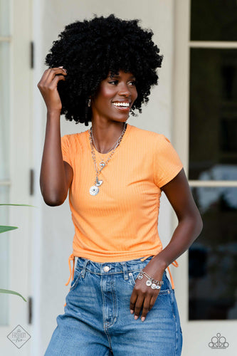 Necklace set including two necklaces, bracelet and earrings displayed on a Model.
