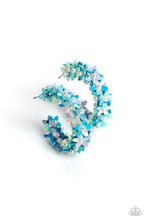 Load image into Gallery viewer, A floral explosion, encompassing the entirety of a thick silver hoop, features reflective light blue flowers dotted with dainty pearl centers for a dreamy, whimsicality below the ear. Earring attaches to a standard post fitting. Hoop measures approximately 1 1/2&quot; in diameter.  Sold as one pair of hoop earrings.
