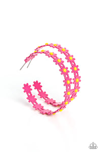 A dainty collection of hot pink daisies with yellow centers blooms into a free-spirited hoop around the ear. Earring attaches to a standard post fitting. Hoop measures approximately 2" in diameter.  Sold as one pair of hoop earrings.