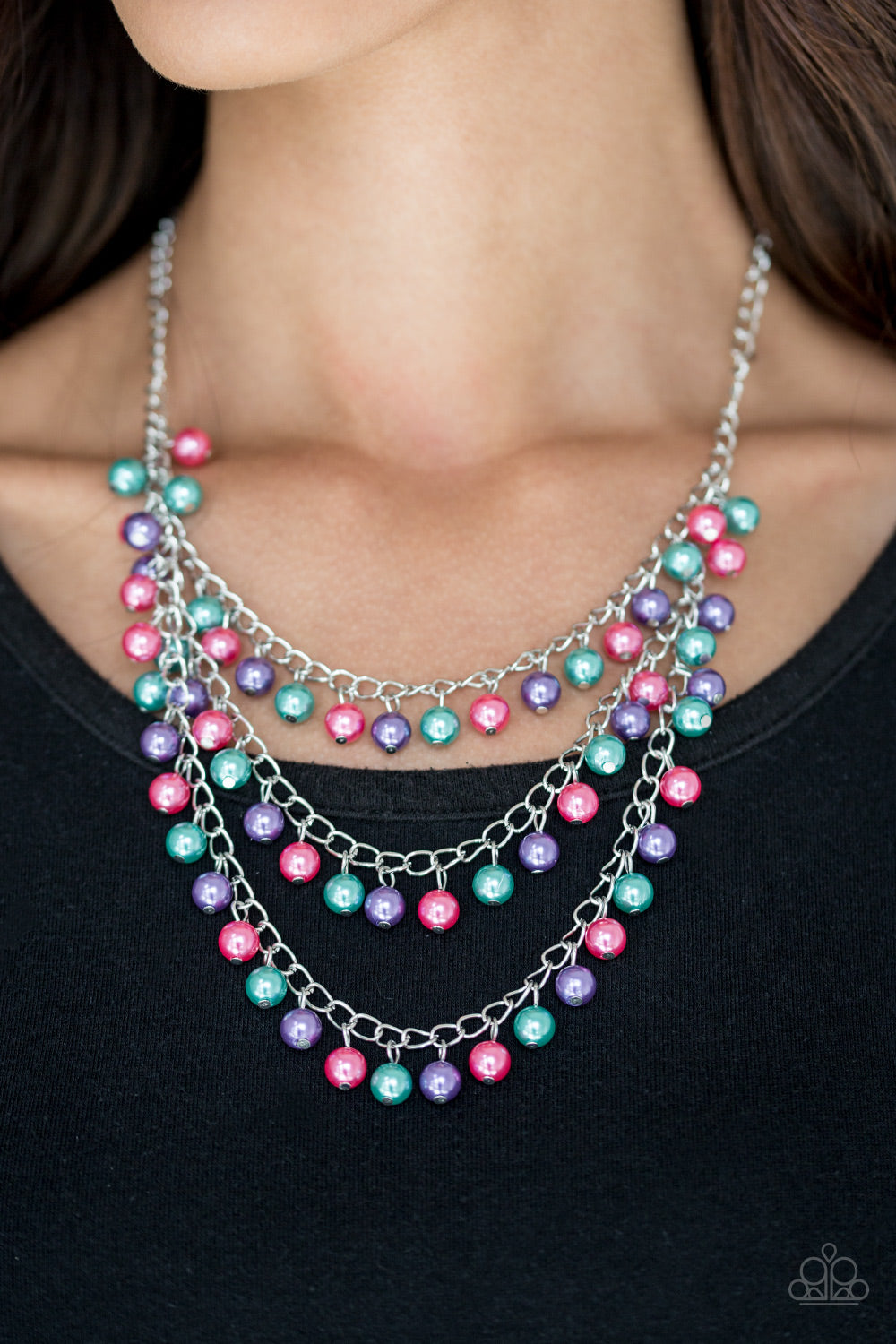Classic green, pink, and purple pearls trickle from three shimmery chains below the collar, adding a timeless twist to a traditional pearl palette. Features an adjustable clasp closure.  Sold as one individual necklace. Includes one pair of matching earrings.