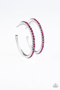 Encrusted in glassy pink rhinestones, a textured silver hoop curls around the ear for a refined look. Earring attaches to a standard post fitting. Hoop measures 1 3/4" in diameter.  Sold as one pair of hoop earrings.