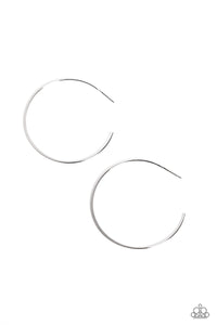 Featuring a high-sheen, a thin smooth silver bar curves into an oversized hoop resulting in a basic staple piece. Earring attaches to a standard post fitting. Hoop measures approximately 2" in diameter.  Sold as one pair of hoop earrings.