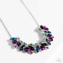 Load image into Gallery viewer, Featuring pronged silver fittings, a sparkly series of marquise-cut rhinestones in varying sizes and opacities are splashed in hues of purple, blue, light blue, baby pink, pink, and green as they fan out below the collar for a vibrant statement. Fuchsia and white round gems in varying sizes sporadically cluster around the marquise-cuts for additional shimmer in the geometric, refined display.  Sold as one individual necklace. Includes one pair of matching earrings.
