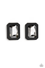 Load image into Gallery viewer, Standing out against a black rubber backdrop, an oversized, faceted emerald-cut gem shimmers and shines for an edgy sparkle against the ear. Earring attaches to a standard post fitting.  Sold as one pair of post earrings.
