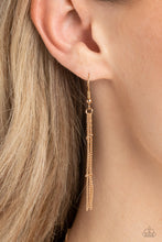 Load image into Gallery viewer, Chains hanging from a gold fish hook earring.

