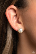 Load image into Gallery viewer, An oversized white pearl, stands out against the ear adding a timeless twist to a basic staple piece perfect for layering. Earring attaches to a standard post fitting.  Sold as one pair of post earrings.
