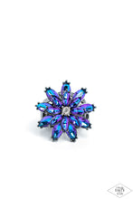 Load image into Gallery viewer, Glittery blue iridescent rhinestone petals stack into a glamorous floral frame atop the finger, creating a blinding centerpiece. Features a stretchy band for a flexible fit. Due to its prismatic palette, color may vary.  Sold as one individual ring.
