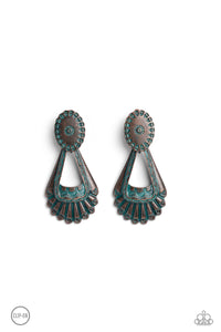 Dangling from a Southwestern-patterned post, a rustic, brass patina frame swings for some aged authenticity below the ear. Feathered details stream from the lower frame for additional artisanal detail. Earring attaches to a standard clip-on fitting.  Sold as one pair of clip-on earrings.