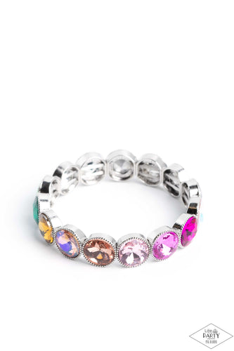 Faceted gems in colorful shades featuring varying shimmers and iridescence are pressed into sleek silver frames. The glittery frames are threaded along elastic stretchy bands, creating a glamorous look around the wrist. Due to its prismatic palette, color may vary.  Sold as one individual bracelet.