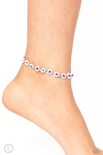 Strung along the entirety of an invisible wire, blue seed beads coalesce around the ankle. The row of blue seed beads are haphazardly interrupted by blooming white seed bead flowers, with pink centers for a carefree, charismatic finish.  Sold as one individual anklet.