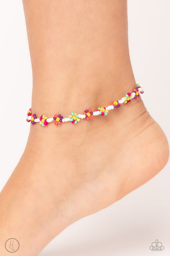 Strung along the entirety of an invisible wire, white seed beads coalesce around the ankle. The row of white seed beads are haphazardly interrupted by blooming colorful seed bead flowers, with yellow centers for a carefree, charismatic finish.  Sold as one individual anklet.