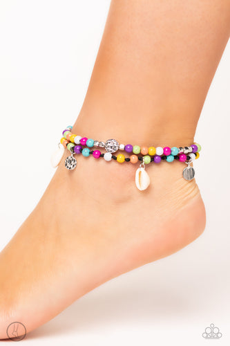 A coastal collection of silver cubes, colorful stone beads, cowrie shells, silver discs, and hammered silver beads slide along a shiny black cord around the ankle for a whimsical look. Features an adjustable sliding knot closure.  Sold as one individual anklet.