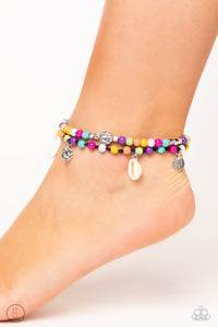 A coastal collection of silver cubes, colorful stone beads, cowrie shells, silver discs, and hammered silver beads slide along a shiny black cord around the ankle for a whimsical look. Features an adjustable sliding knot closure.  Sold as one individual anklet.