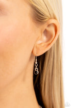 Load image into Gallery viewer, Embossed in an elongated dotted motif, a rustic collection of silver discs in varying sizes ruggedly links below the collar for an artisan inspired fashion. A faceted, oval, black gem sits at an angle on the biggest disc for a dauntless pop of color against the neckline. Features an adjustable clasp closure.  Sold as one individual necklace. Includes one pair of matching earrings.
