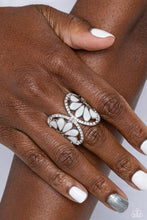 Load image into Gallery viewer, Two concaved half circle frames dotted with dainty white rhinestones meet in the center to create a glittering centerpiece atop the finger. Set in the airy frames, teardrops featuring white pearly paint in varying sizes creates a whimsical pop of color amidst the refined display. Features a stretchy band for a flexible fit.  Sold as one individual ring.
