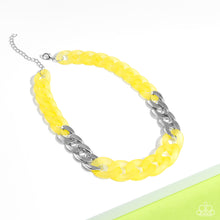 Load image into Gallery viewer, Brushed in a vibrant Empire Yellow finish, a strand of acrylic curb chain combines with links of a silver curb chain to dramatically drape across the chest for a whimsical yet bold look. Features an adjustable clasp closure.  Sold as one individual necklace. Includes one pair of matching earrings.
